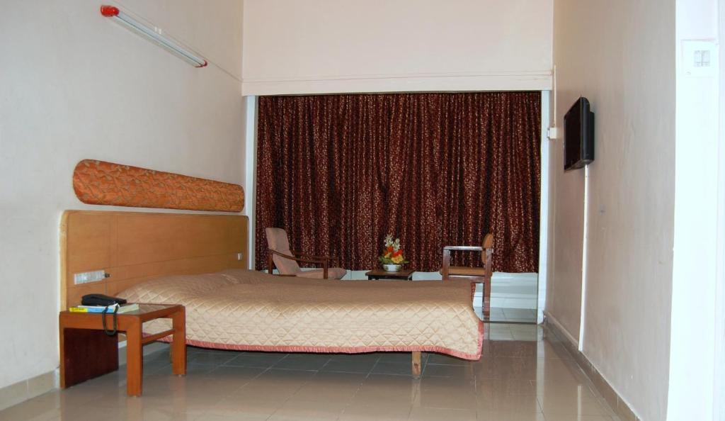 Hotel Raviraj Pune Oda fotoğraf